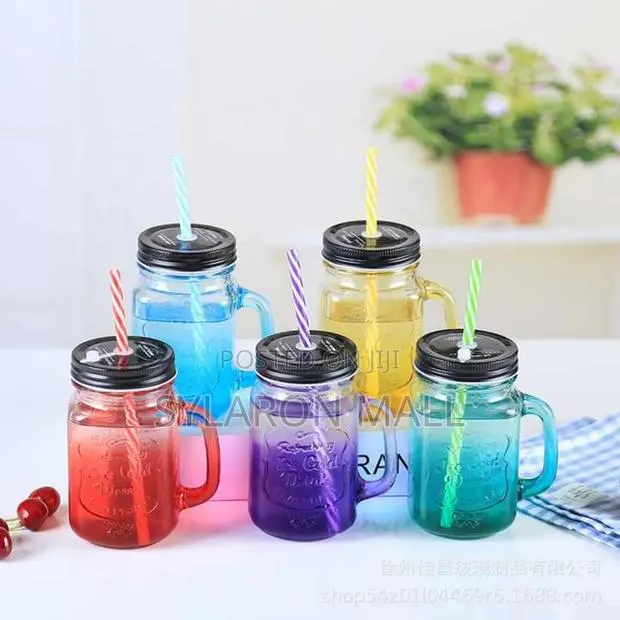 Glass Jar With Straw and Lid · Photo 1