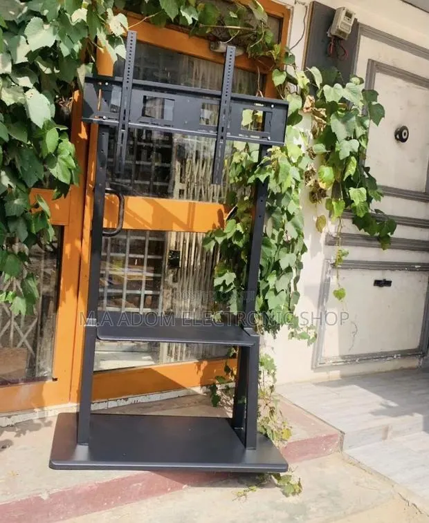 Quality Heavy Duty Mobile Tv Stand With Wheels for 32-100”. · Photo 1
