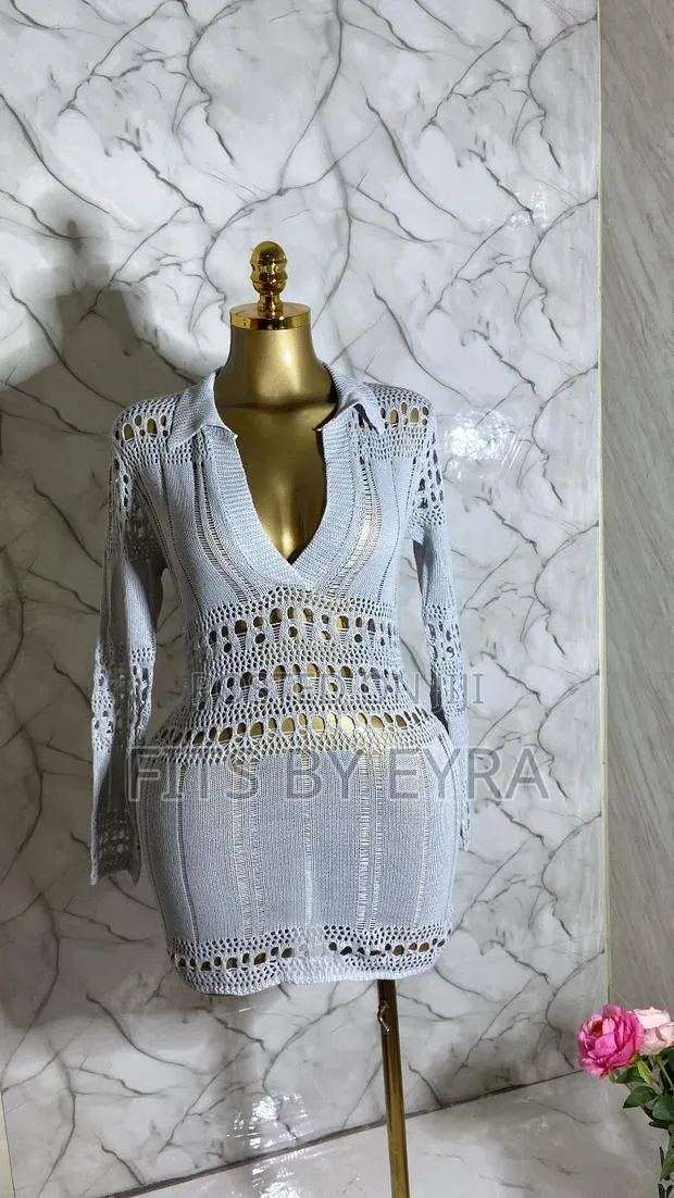 A Chic White Crochet Mini Dress · Photo 1