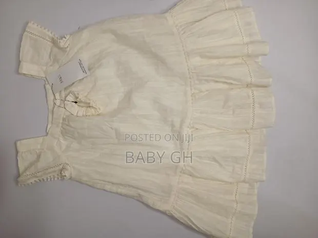 Marks and Spencer Offwhite Dress With Ruffled Trims · Photo 1