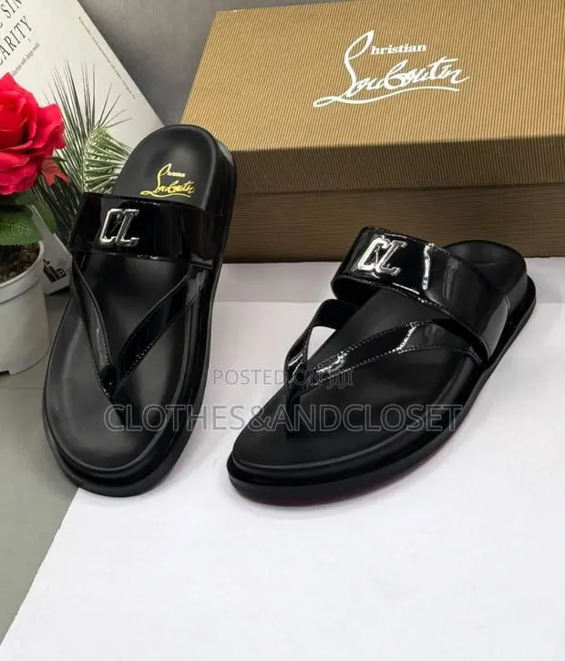 A Black Patent Leather Thong Sanda