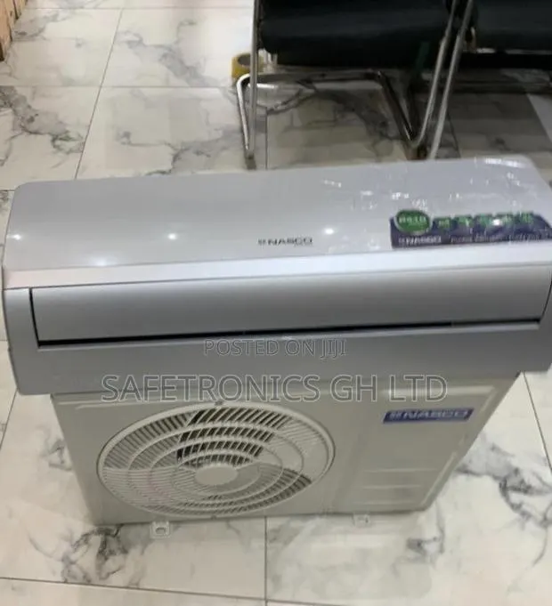 Ultra Best (Sliver) Nasco 1.5 Horsepower Split Type AC · Photo 1
