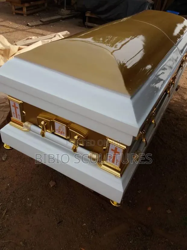 White and Gold Casket With Brown Lid · Photo 1