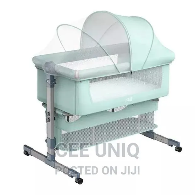 Bedside Bassinet With Net and Swing · Photo 1