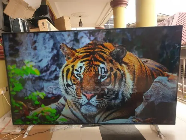 86"LG Uhd HDR Edgeless Smart Satellite TV · Photo 1