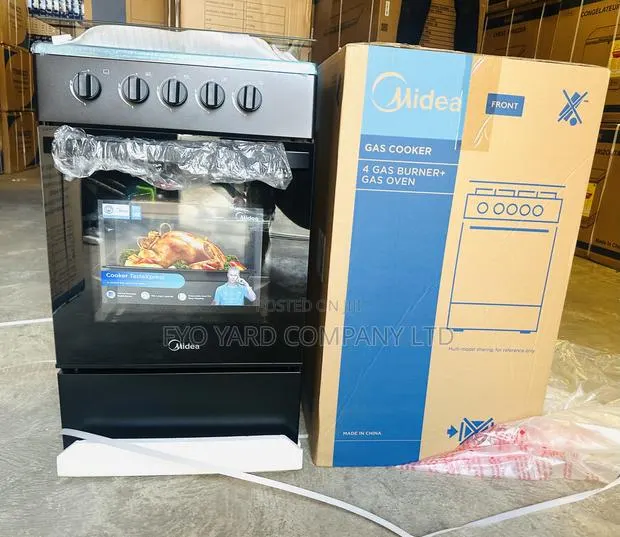Fast Cooking Midea Oven and 4 Top Burners Cooker · Photo 1