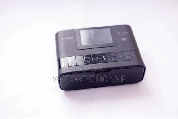 Canon Selphy 1300 · Photo 1