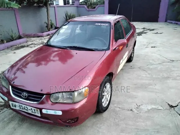 Toyota Corolla 1999 Red · Photo 1