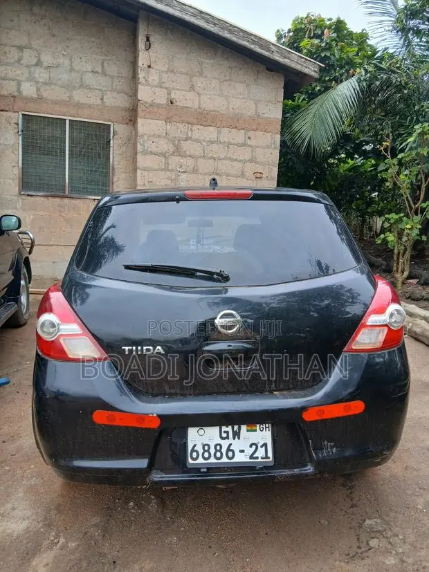 Nissan Tiida 2009 Black · Photo 1