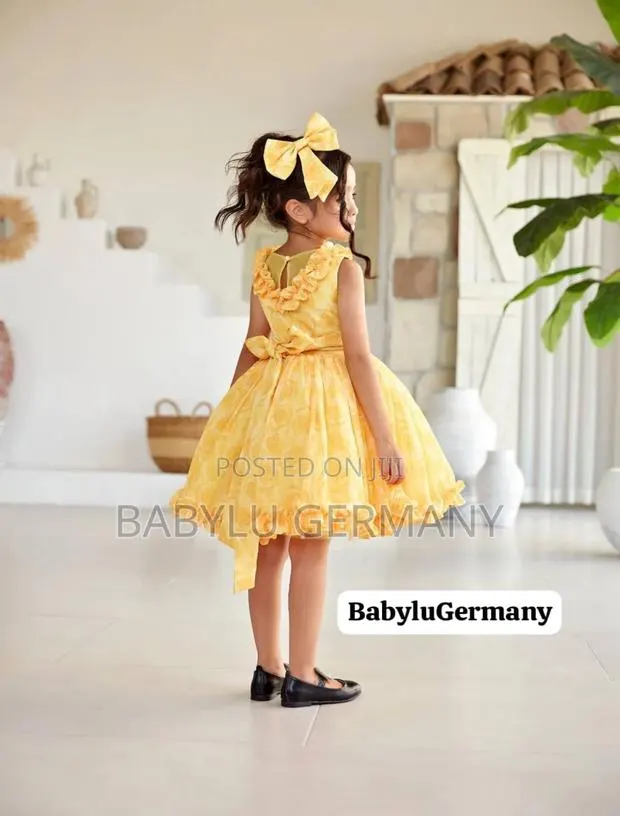 Yellow / Gold Turkey Luxury Brand Dress With Hair Bow · Photo 1