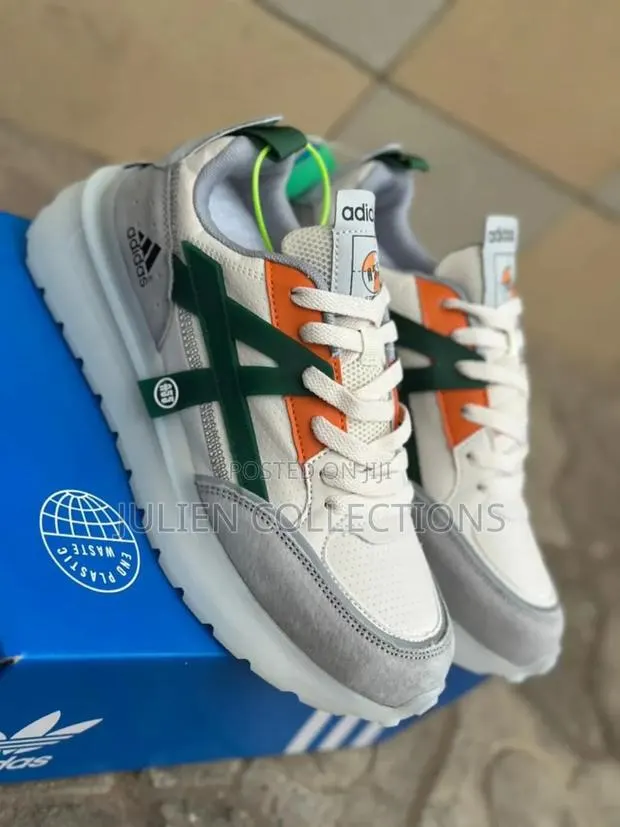 Adidas Trains A55 Green White and Orange · Photo 1