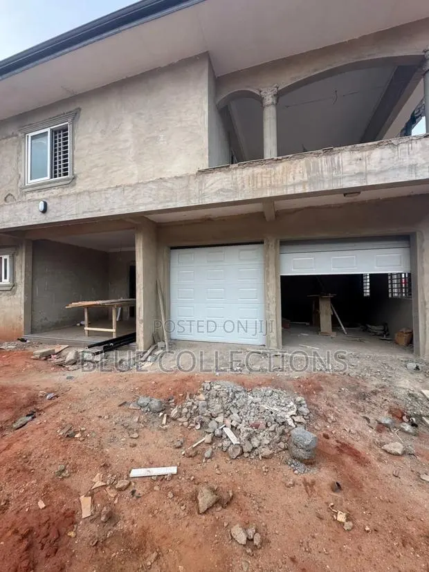 Original Double Panel Garage Door · Photo 1