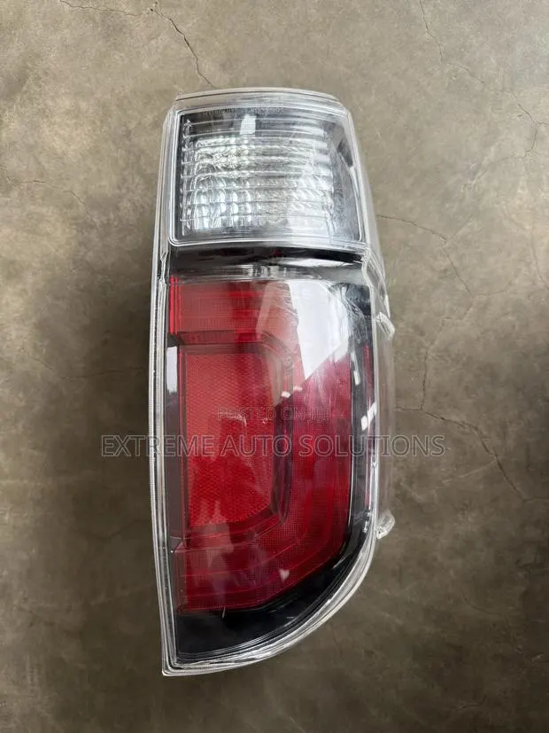 Genuine Toyota OEM TRD PRO Smoked Bezel Tail Light (LH) · Photo 1