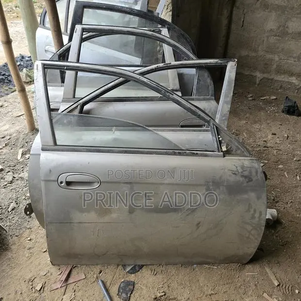 Kia Spectra 2002 Doors · Photo 1