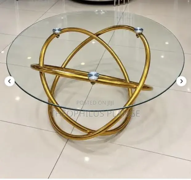 Ring Base Glass Center Table · Photo 1