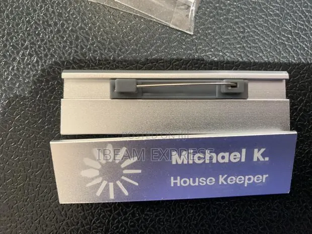 Engraving on Silver Name Tags · Photo 1