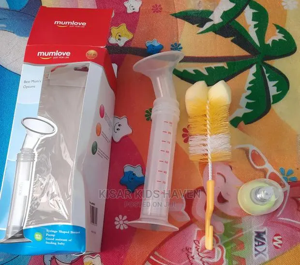 Syringe Shaped Manual Breast Pump With Bottle Brush · Photo 1