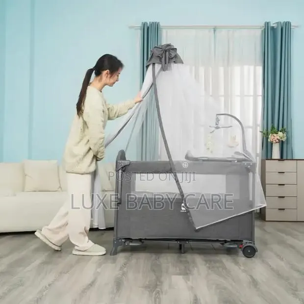 Baby Bed With Net and Play Center · Photo 3