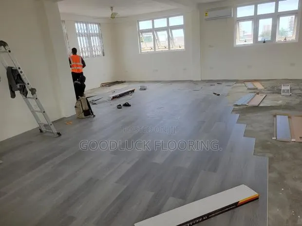 Spc(Stone Plastic Composite) Floor Installer. · Photo 1