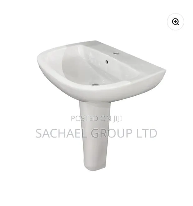 Handwashing Basin With a Pedestal · Photo 1