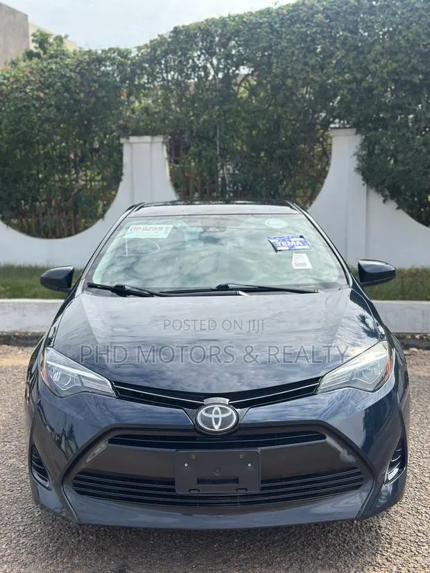 Toyota Corolla LE (1.8L 4cyl 2A) 2018 · Photo 1