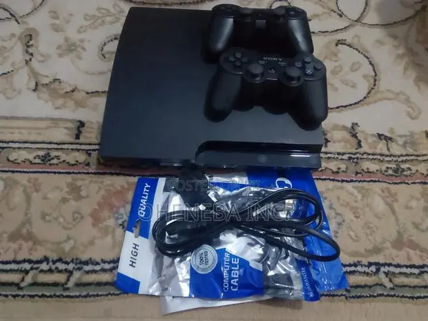 PS3 Slim Console + 10 Games Installed+ 2 Controllers · Photo 1