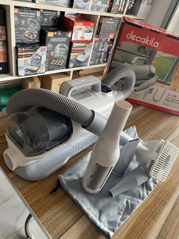 3in1 Pet Hair Vacuum Groomer and Dryer for Dogs and Cats · Photo 1