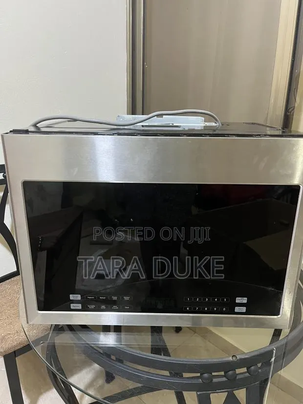 Premium Stainless Steel Microwave Oven · Photo 1