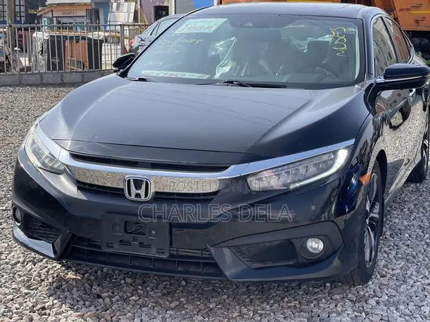 Honda Civic Touring 4dr Sedan (1.5L 4cyl) 2017 Black · Photo 1