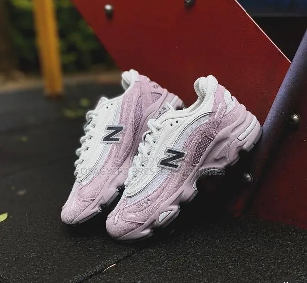 New Balance 1000 Sneakers (Pink/White Colorway). · Photo 1