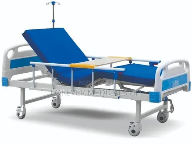 Hospital Bed 1 Crank With Mattress, Drip Stand and Overhead Table · Photo 1