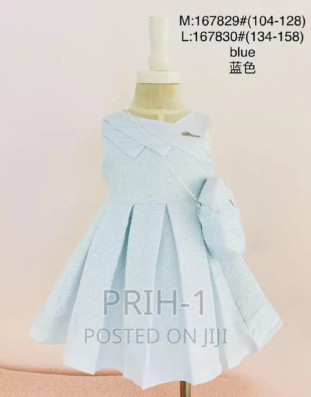 Girls Adorable Dress With Hand Bag · Photo 1