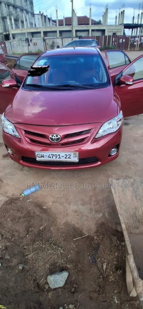 Toyota Corolla L 4-Speed Automatic 2013 Red · Photo 1