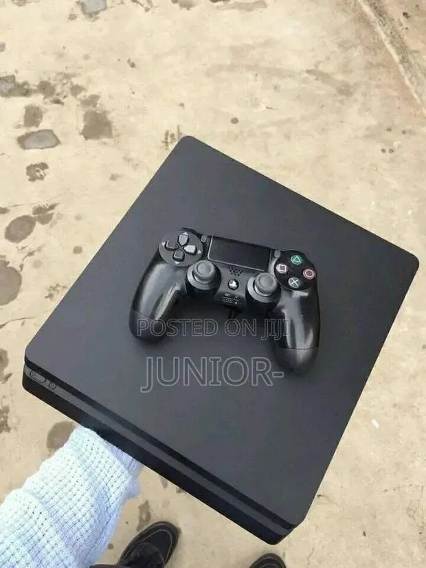 PLAYSTATION 4 Slim CUREENT FC27 2 Pads and 10 More Installed Games · Photo 1