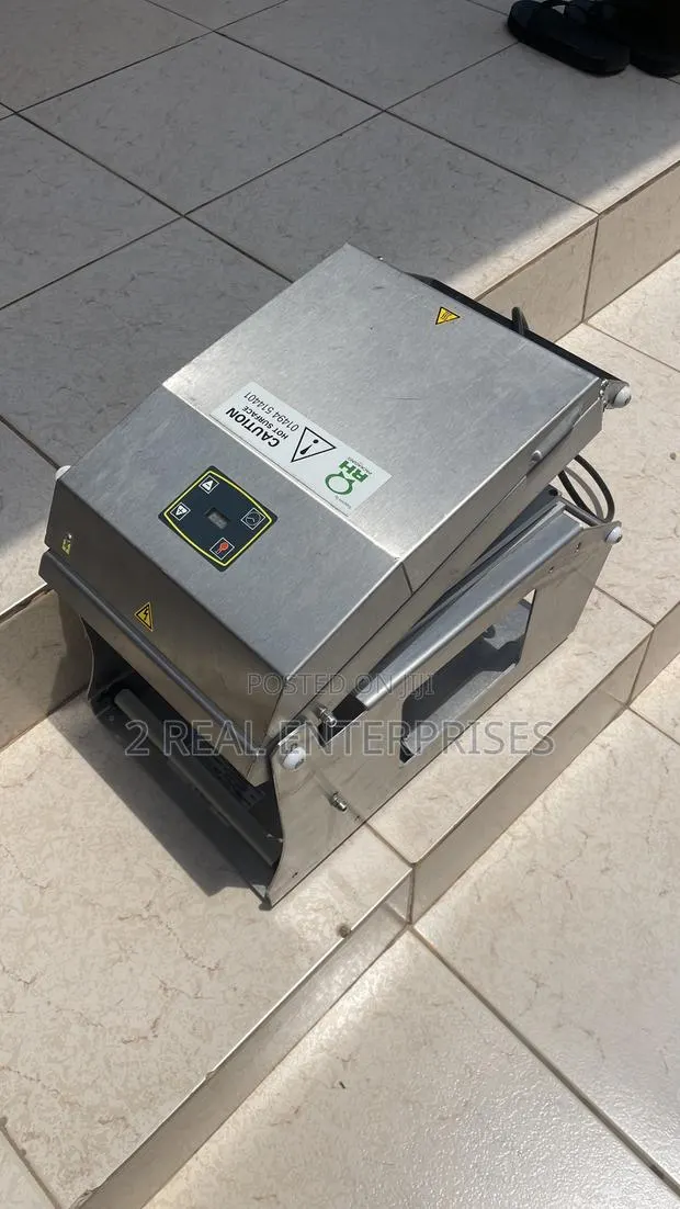 Electric Manual Food Tray Sealer Machine · Photo 1