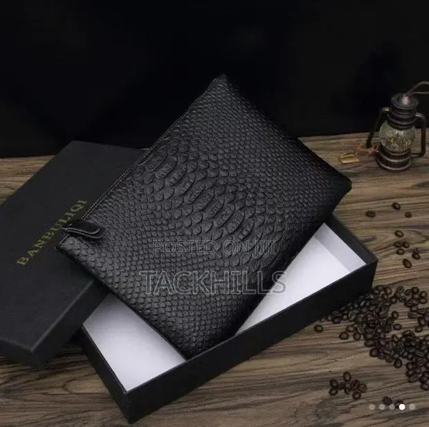 Men Clutch Side/Hand Bags · Photo 1