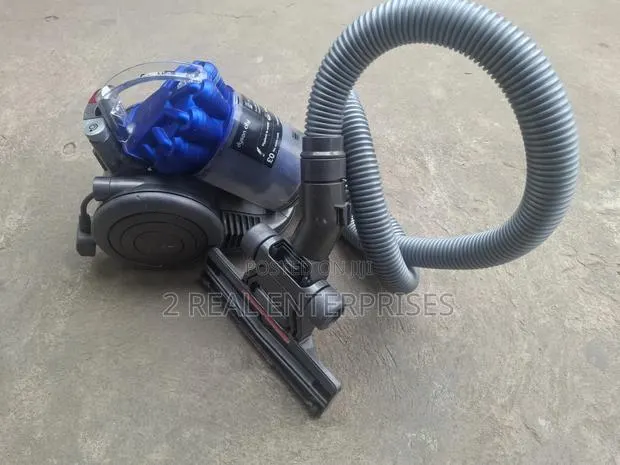 Dyson DC26 City Ultra-Compact Bagless Cylinder Vacuum Cleaner (Blue) · Photo 1