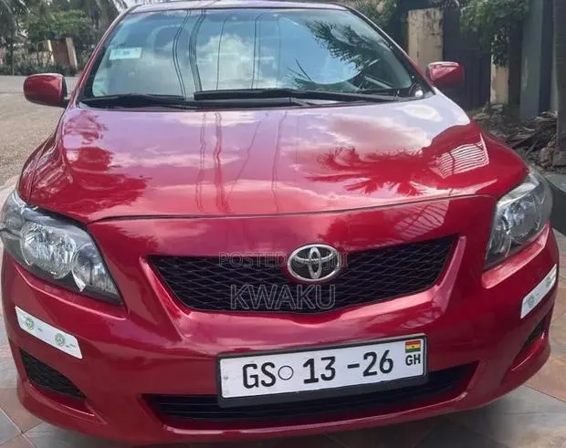 Toyota Corolla 2010 Red · Photo 1