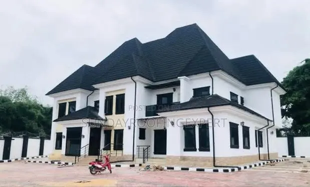 Best Black Gutter and Pipe Stone Coated Tiles · Photo 1