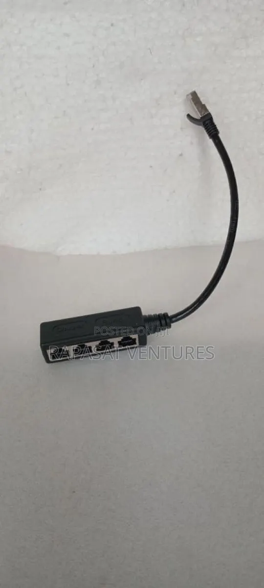 Rj45 Male To 4 Port Rj45 Female Splitter · Photo 1