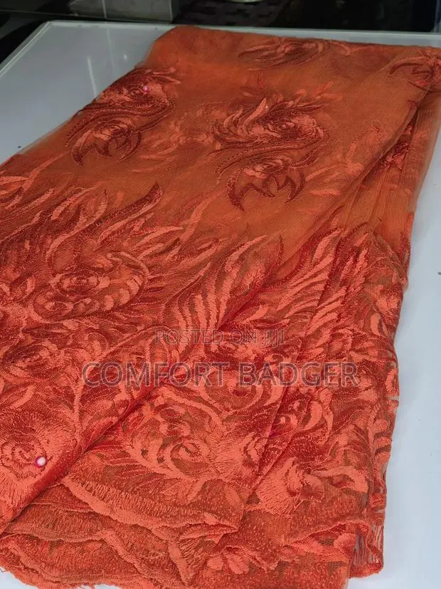 Lightweight Burnt Orange Net Lace · Photo 1