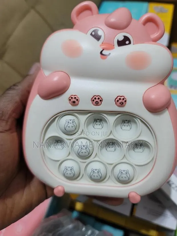 Keep Your Brilliant Kids Busy With the New Pop It | Pink · Photo 1