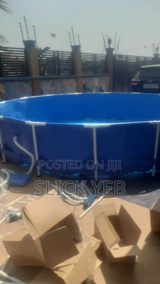 Round Metal Frame Above Ground Swimming Pool · Photo 1