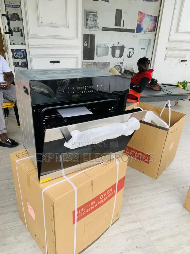 Brand New Kenwood Built in Oven 71 Liter , Sliver Stainless Steel · Photo 1