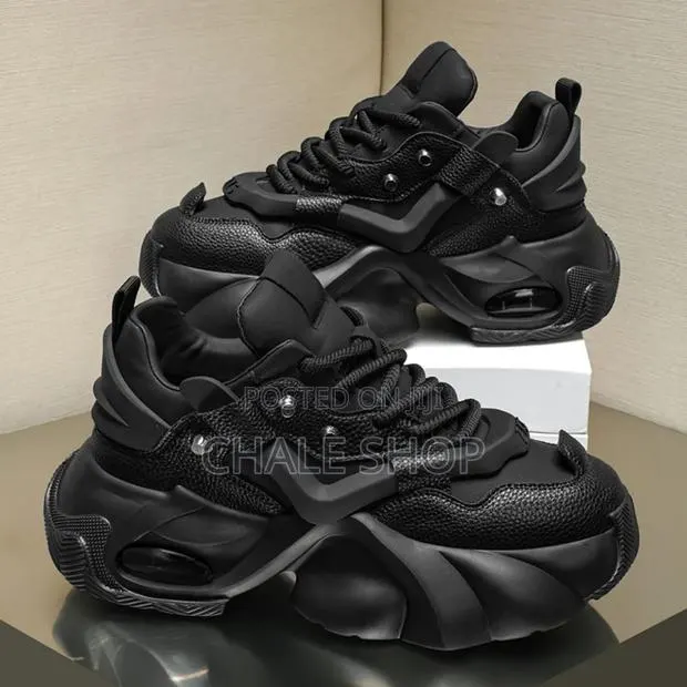 Smart Girl Wear Trendy All-Black Chunky Platform Sneakers · Photo 1