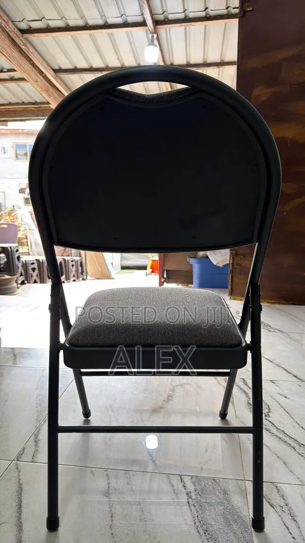 Black Padded Folding Chair · Photo 1