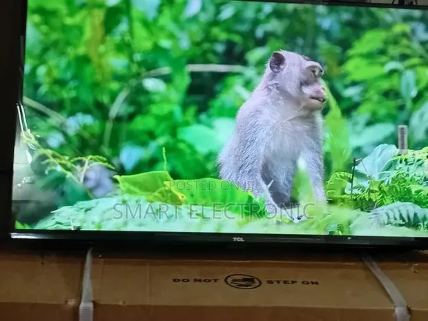 TCL 32” Qled Television With Advanced Smart Functions · Photo 1