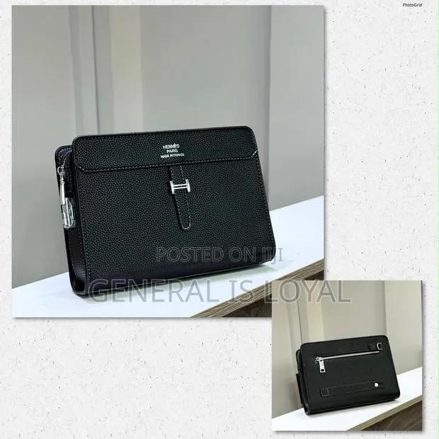 Hermes Black Leather Men’s Purse With Lock · Photo 1