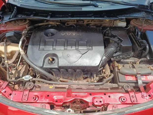 Toyota Corolla 2011 Red · Photo 1
