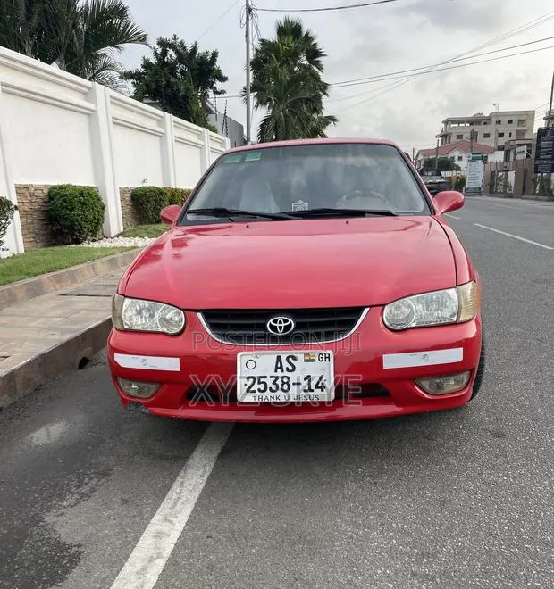 Toyota Corolla 2004 Red · Photo 1